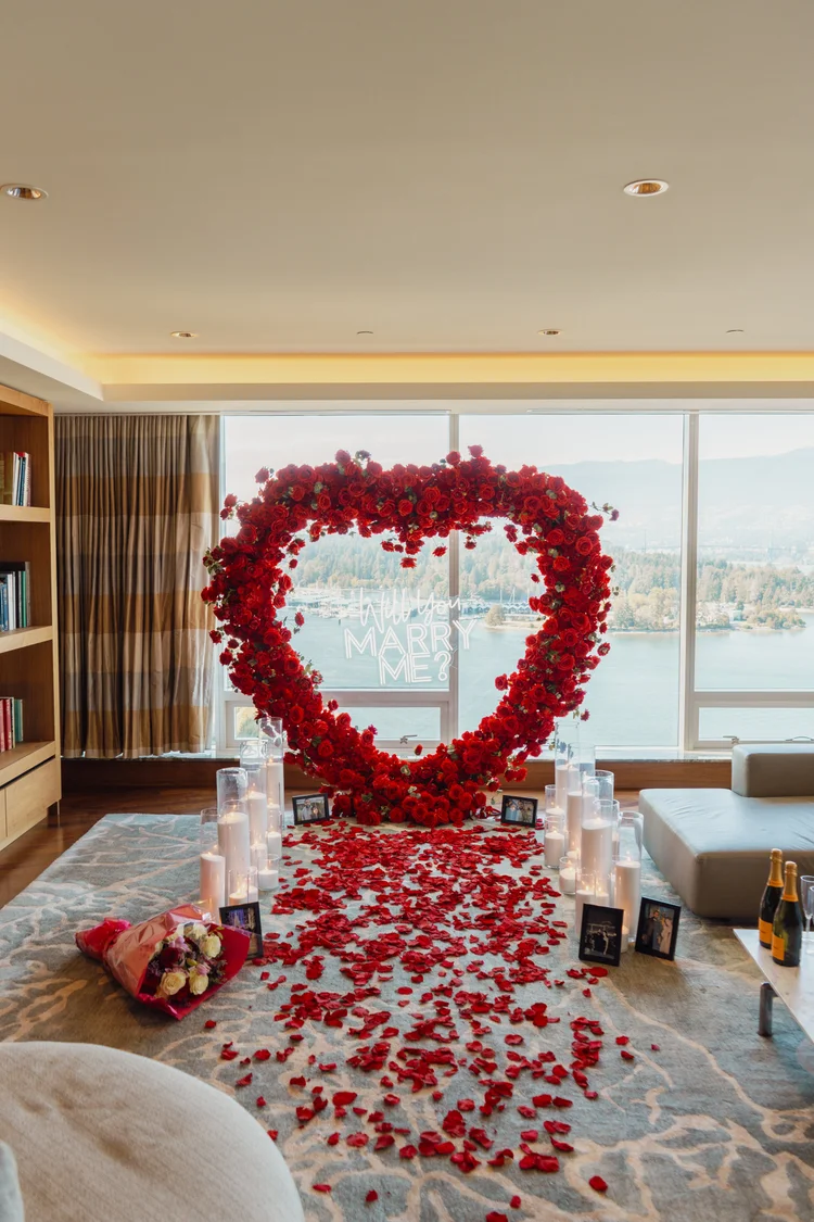 Hotel suite proposal with red floral arch and river view