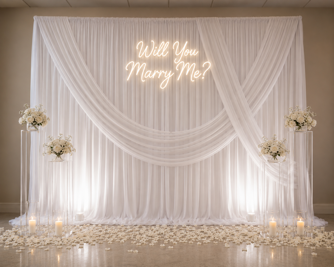Elegant draped backdrop proposal with white florals, neon sign and candles